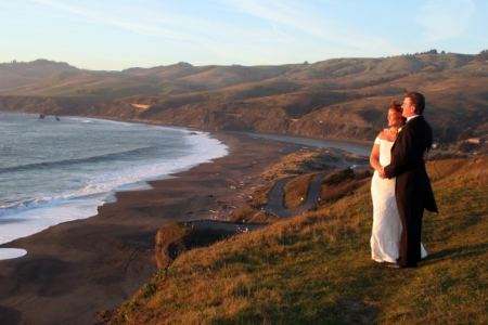 Wedding photo bride and groom at sunset