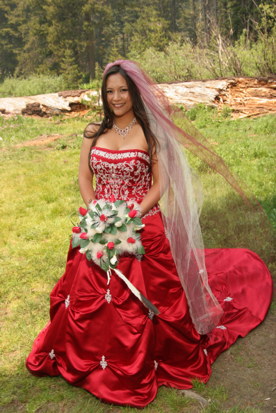 Bride in red wedding dress in Yosemite National Park